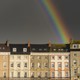 Photograph of a rainbow over houses in the UK