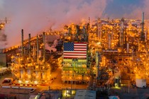 An oil field in McKintrick, California, with an American flag displayed