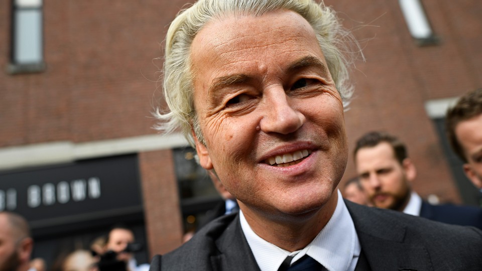 Dutch far-right politician Geert Wilders of the PVV party smiles during a recent rally in the Netherlands.