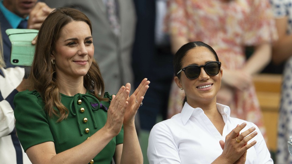 A photo of Meghan Markle and Kate Middleton at the Wimbledon Tennis Championships.