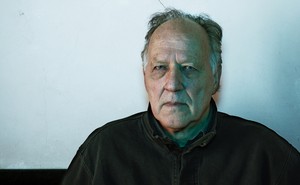 Photograph of Werner Herzog staring intently at the camera