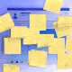 Sticky notes cover a social-media post