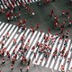 crosswalk covered in people walking with red circles around their heads