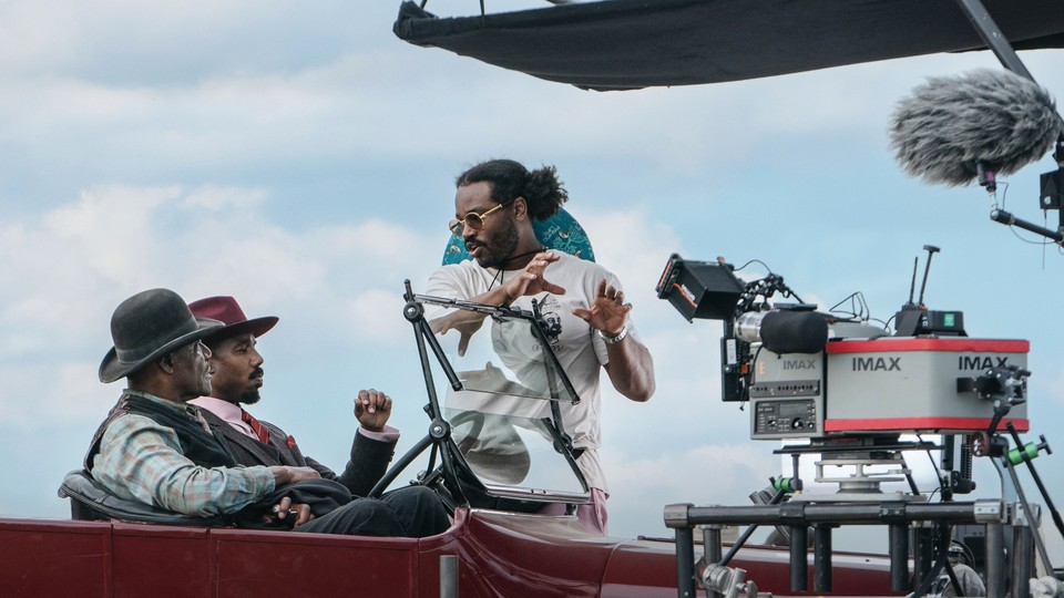 Delroy Lindo, Michael B. Jordan and director Ryan Coogler on the set of Sinners