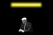 A photo-illustration of Donald Trump surrounded by darkness, with a glowing bar of yellow light above him