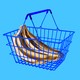 Gold-colored bananas inside a blue shopping basket against a baby-blue background