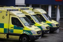 Ambulances wait outside the emergency department at the Royal University Hospital in Liverpool, England, in January 2017.