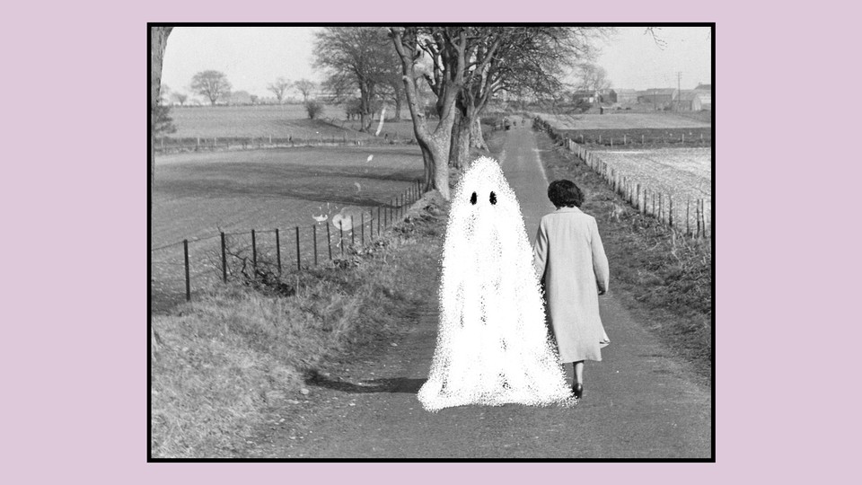 Ghost next to a woman as she walks down a country road