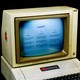 ChatGPT displayed on an old Apple II computer.