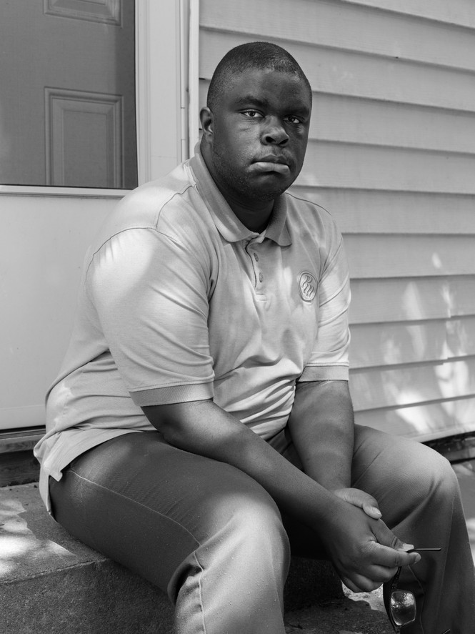 Jevon Okundaye at home in Boston, MA.