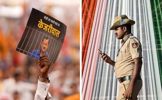 A policeman checks his phone during an Indian National Congress party