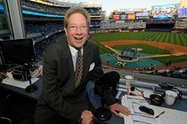 New York Yankees broadcaster John Sterling in his booth before game against the Boston Red Sox in 2009