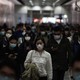 People in Hong Kong wearing face masks.