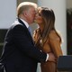 President Donald Trump and Melania Trump kissing on the cheek