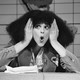 Photo of Gilda Radner as her SNL character Roseanne Roseannadanna