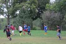 Ecuadorian immigrants play soccer in Powderhorn Park in Minneapolis.