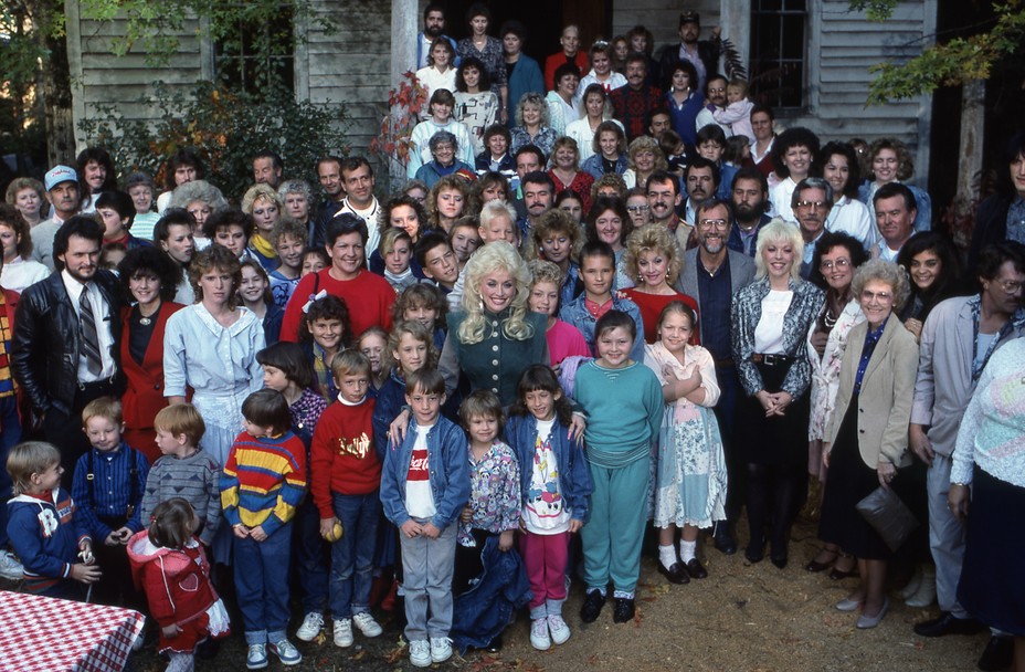 a group of people smile for a photo
