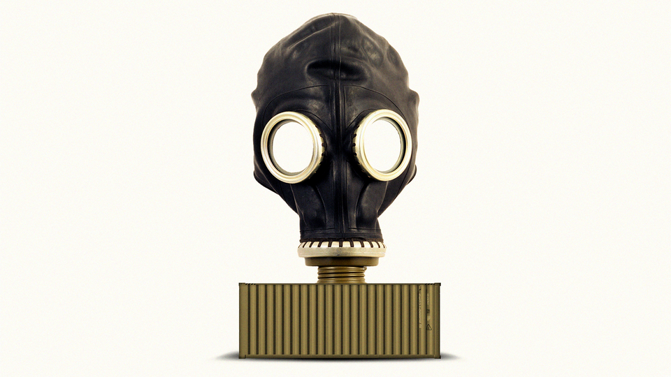 Gas mask over shipping container