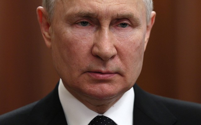 Putin looks concerned in a close-up photo.