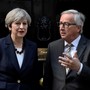 Britain's Prime Minister Theresa May welcomes Head of the European Commission, President Jean-Claude Juncker to Downing Street on April 26, 2017.