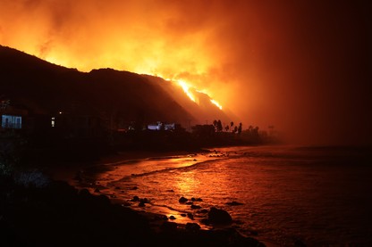 The Palisades Fire burns along the Pacific Coast Highway in Malibu, California, on January 8, 2025.