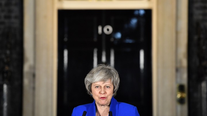 Theresa May speaks to reporters after surviving a no-confidence vote on January 16.