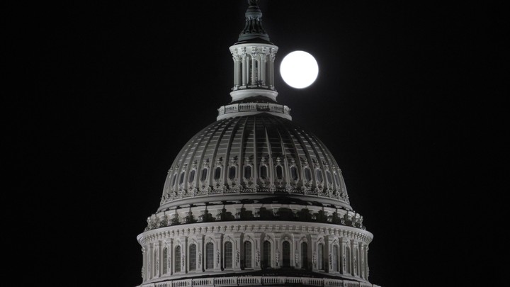 The moon over the Capitol. Totally not spooky.
