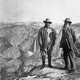Theodore Roosevelt stands with John Muir on Glacier Point in Yosemite.