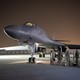 A U.S. Air Force flight crew leaves its base in Doha and prepares to strike Syria in response to its use of chemical weapons in April.