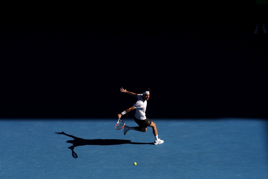 Dominic Thiem runs to make a return.