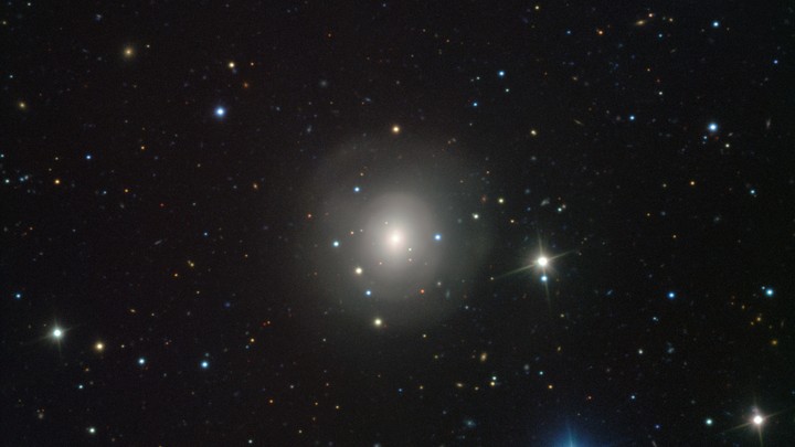 A starry sky with one very bright spot centered