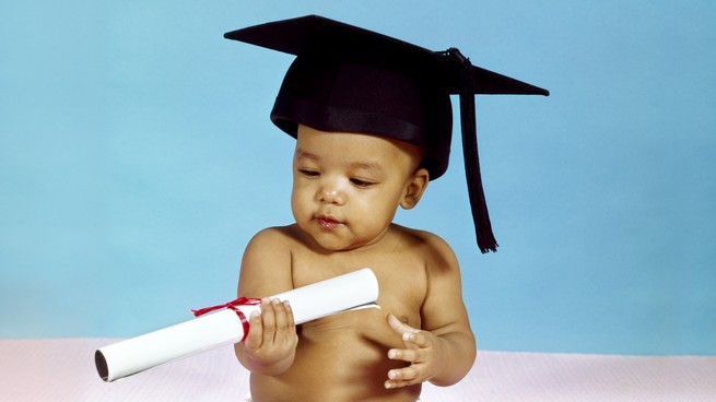 baby with graduation cap and diploma