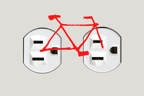 An illustration of a bicycle superimposed over two electrical sockets