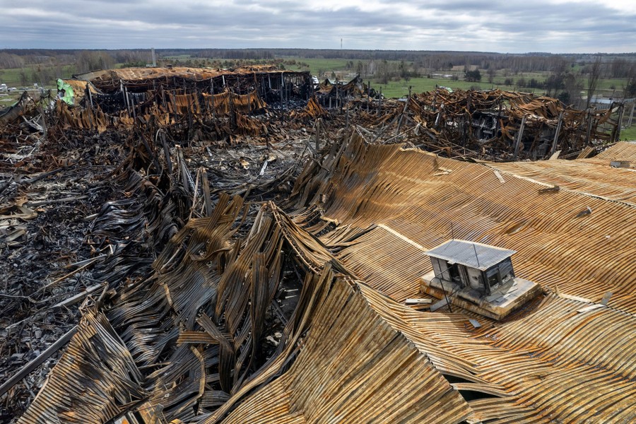 An aerial view of a huge destroyed commercial building.