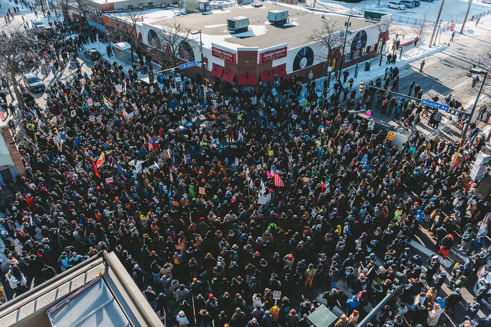A large crowd gathers on Nicollet Ave to protest ICE