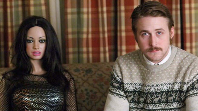 Ryan Gosling sits next to a doll in 'Lars and the Real Girl'