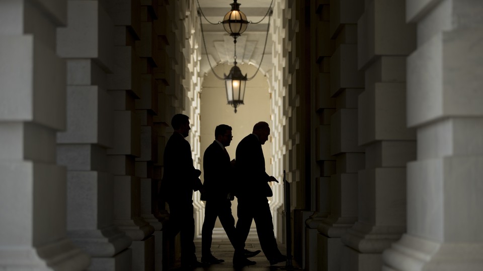 Senate Minority Leader Chuck Schumer (right) walks into the Capitol after attending a rally on Capitol Hill this week.