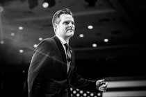 A black-and-white photo of Matt Gaetz