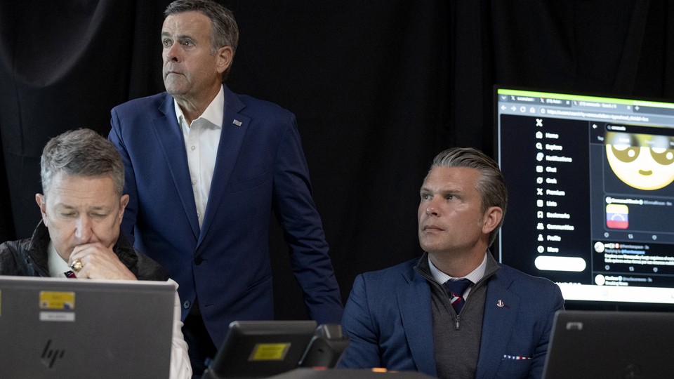 Photograph of Pete Hegseth in the makeshit war room in Mar-a-Lago