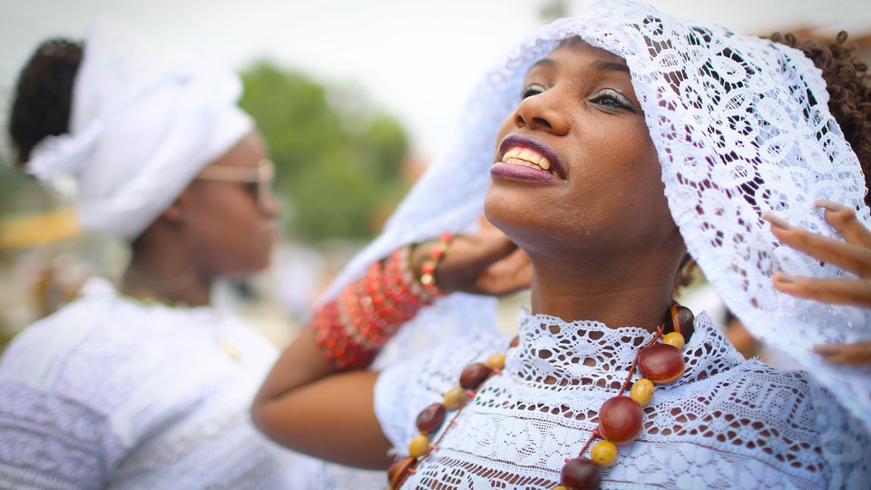 Women at a festival honoring an African goddess in February 2018