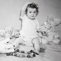 photograph of child playing with toys