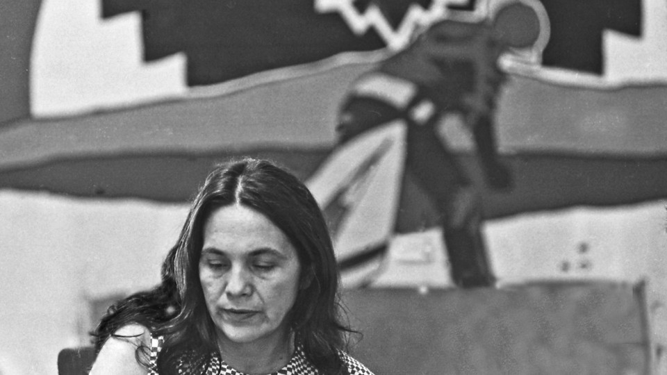 An image of Dolores Huerta looking downward and solemn.