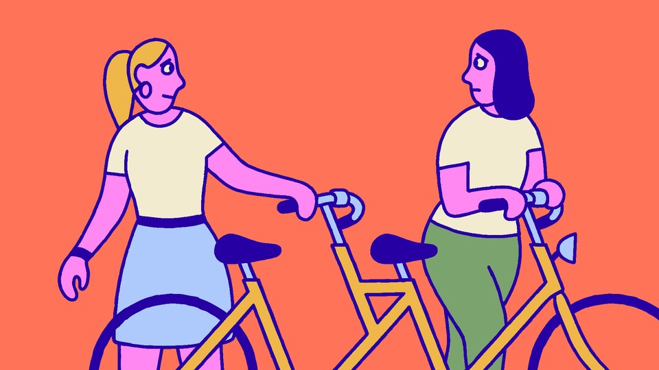 Two women with a tandem bike but pulling away from each other