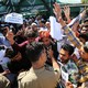 Protesters shouting at policemen