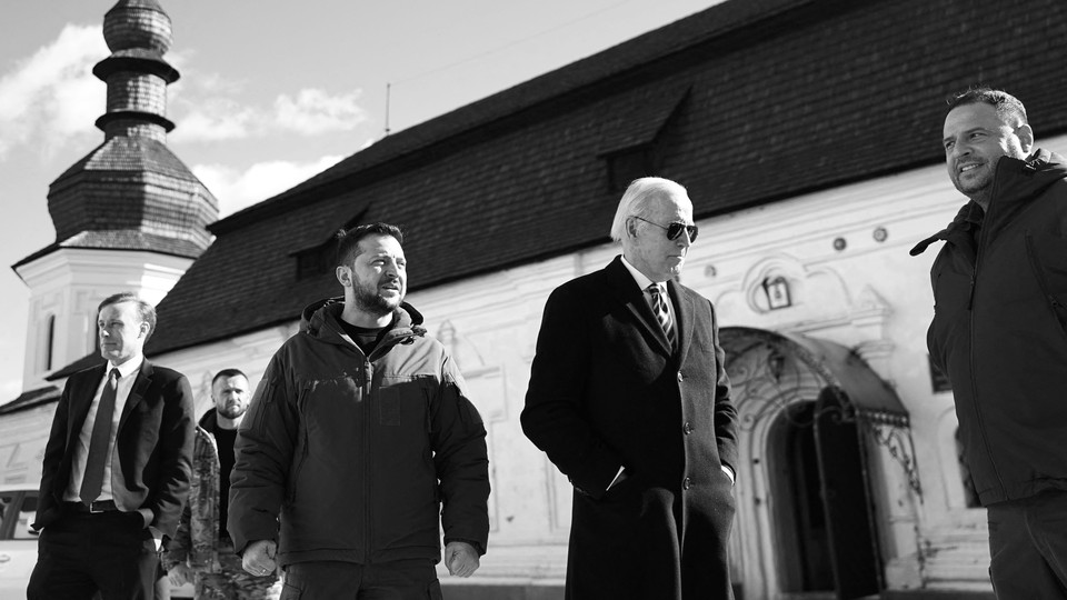 Joe Biden and Volodymyr Zelensky in front of a church