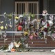 Photograph of flowers hanging from the fence at the Adass Israel Synagogue