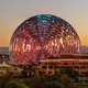 The Sphere stands against the Las Vegas skyline, its screen projecting a hypnotic rippling pattern
