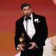 Bad Bunny accepting an award at the 2026 Grammys