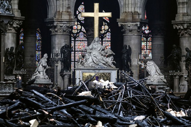 Notre-Dame cathedral interior on April 16; the altar surrounded by charred debrief from the collapsed ceiling 