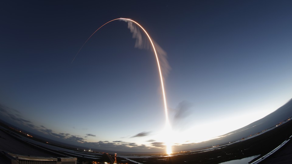 A long-exposure view of the Atlas V rocket, with the Boeing Starliner capsule on top, launching into space this morning